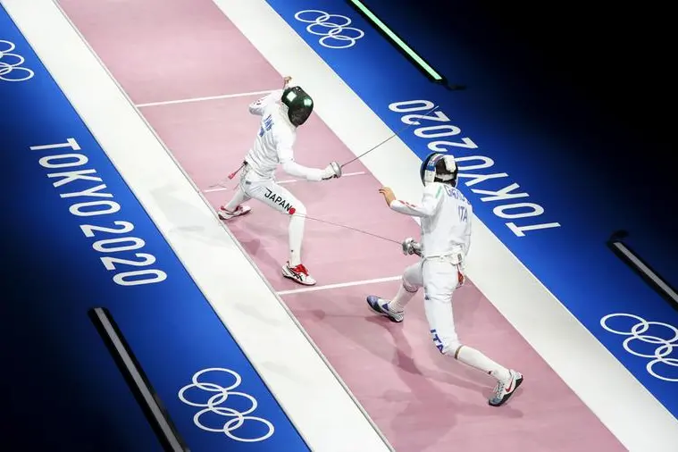 Tokyo 2020 Olympics - Fencing - Men's Individual Epee - Last 32 - Makuhari Messe Hall B - Chiba, Japan - July 25, 2021. Enrico Garozzo of Italy in action against Koki Kano of Japan REUTERS/Maxim Shemetov