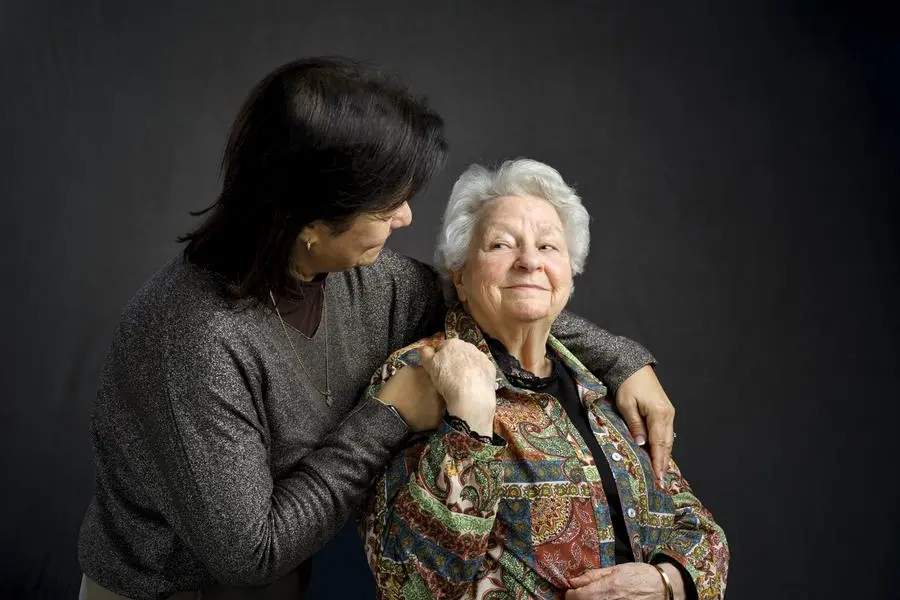 Nella foto: lo sguardo carico di significato fra Nassera Kermiche, 62 anni (a sinistra), mamma di Adel, autore dell\\u2019attentato a padre Hamel, e Roseline Hamel, 85, sorella del sacerdote ucciso il 26 luglio 2016 mentre celebrava la Messa a Saint Etienne du Rouvray (Francia). , Courtesy Bruno L\\u00E9vy / XO UFF ST